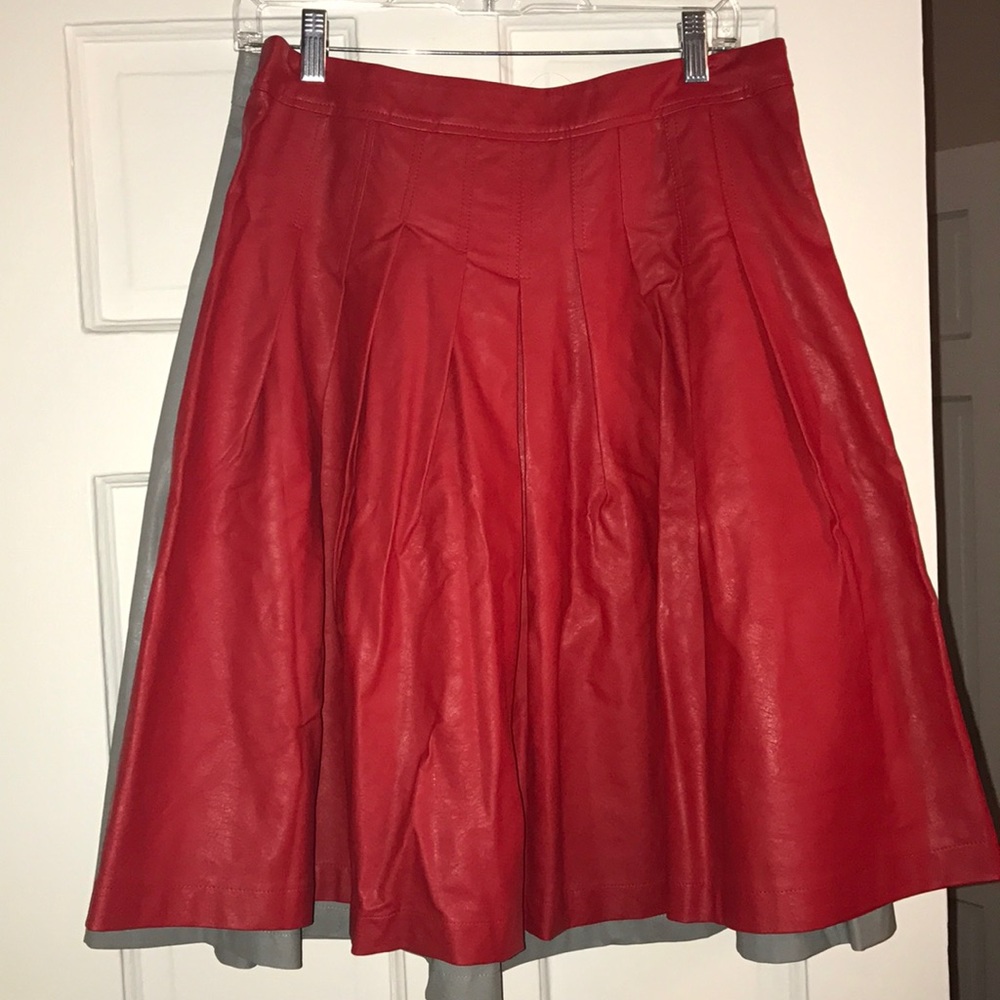 TWO Synthetic Leather Pleated Skirts